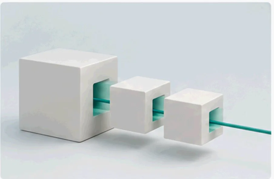 An ivory block separating into three modules along a continuous teal route